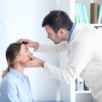 Eye doctor examining a patient's eyes