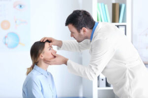 Eye doctor examining a patient's eyes
