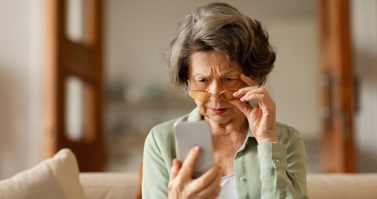 Older Woman Squinting in Glasses
